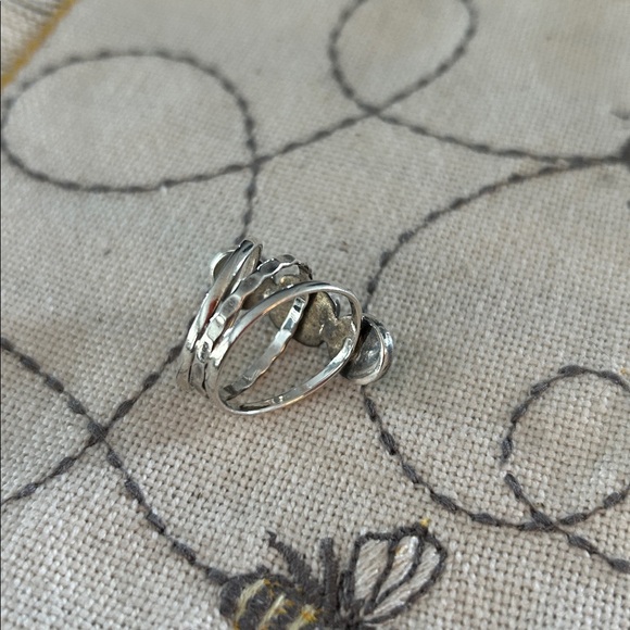 TWO rings one is a 9.25 silver ring sz is 7 AND the cream bow tie is sz 7 1/2 - Picture 11 of 11